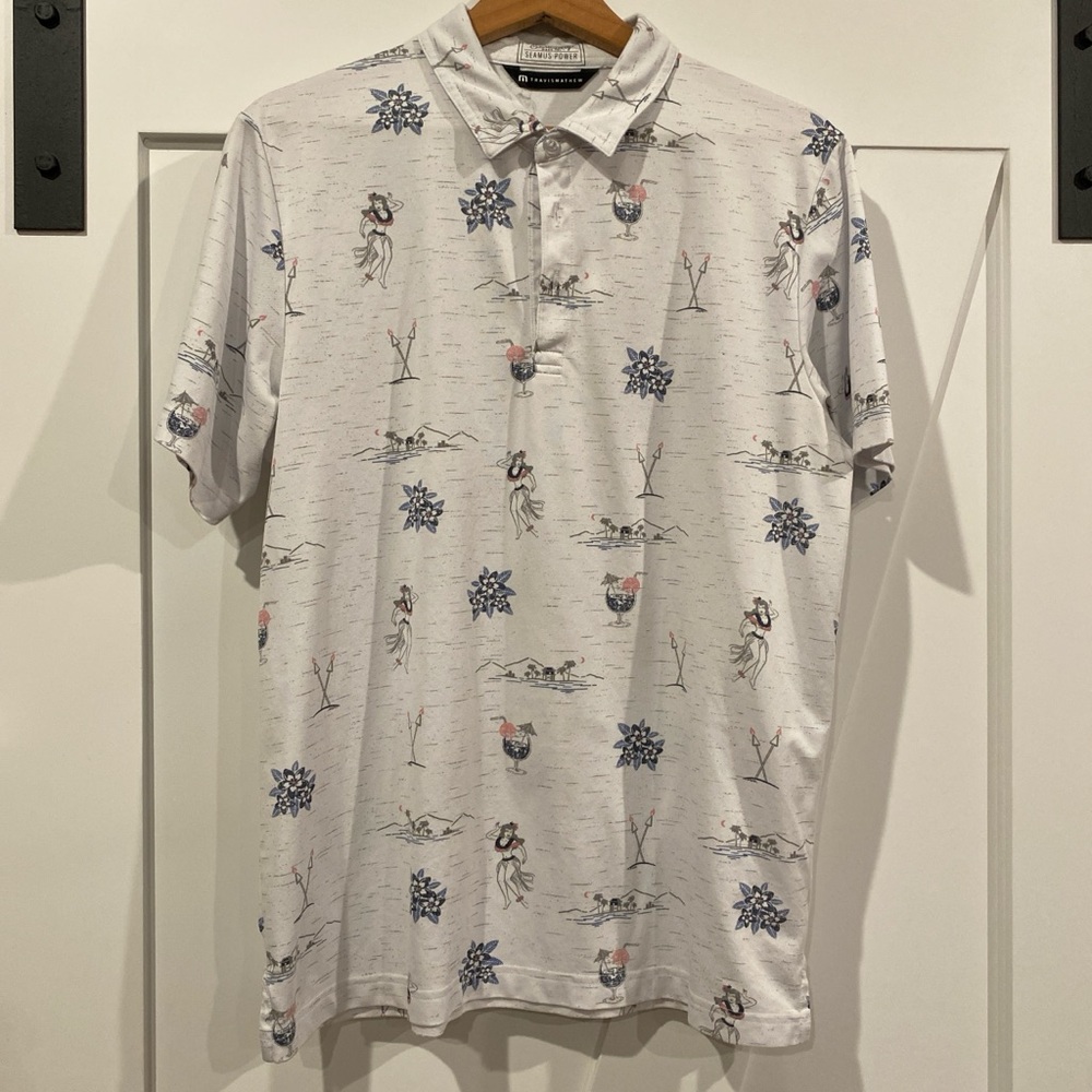Travis Mathew White Polo with Blue and Red Accents